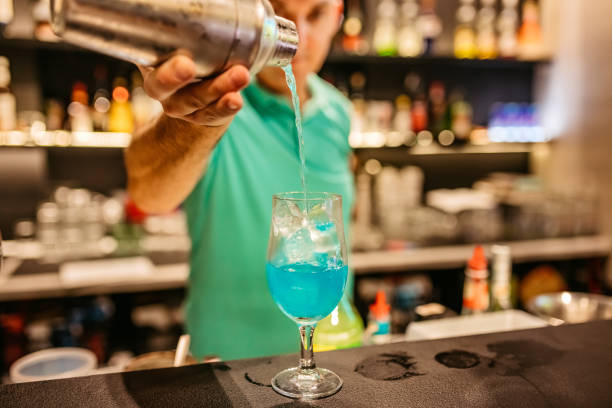 istock Bartender making Tijuana taxi cocktail on bar counter 1333433257