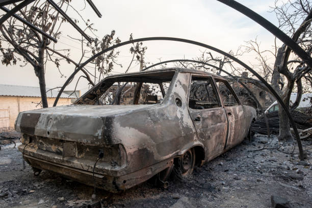 istock Burnt and damaged car 1333435177