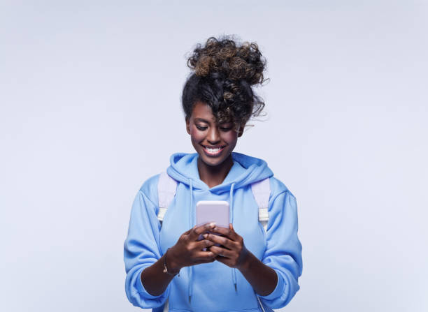 istock Surprised female student in blue hoodie 1333435288