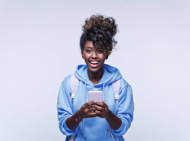 istock Surprised female student in blue hoodie 1333435889
