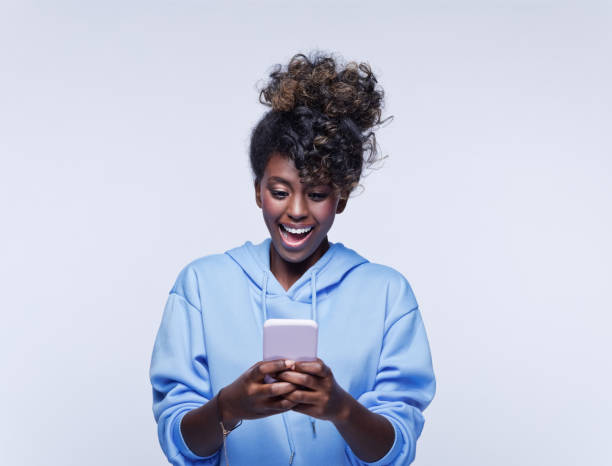 istock Surprised female student in blue hoodie 1333436011