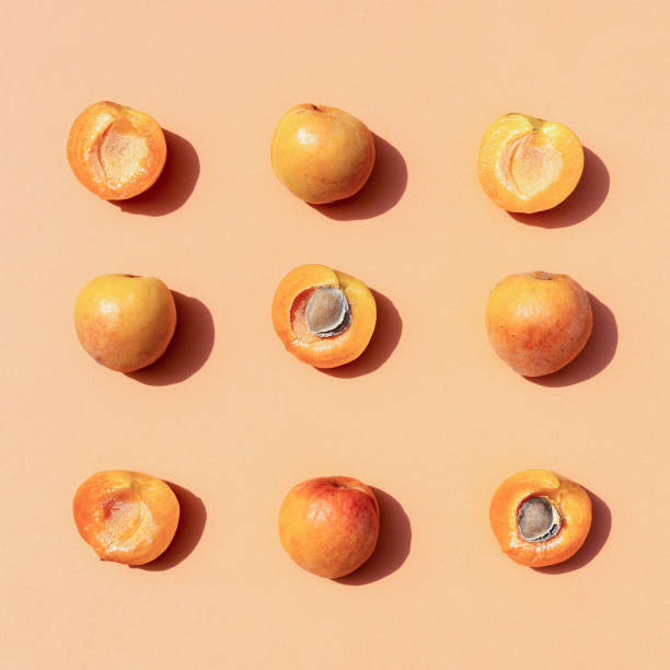 istock Apricot on pastel orange background. 1333436109