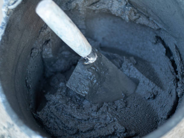 istock a bucket with a masonry mixture for laying bricks on a construction site. cement in a bucket 1333437041