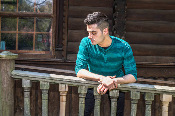 istock Young man standing outdoors in New York City, relaxing, thinking. 1333443678