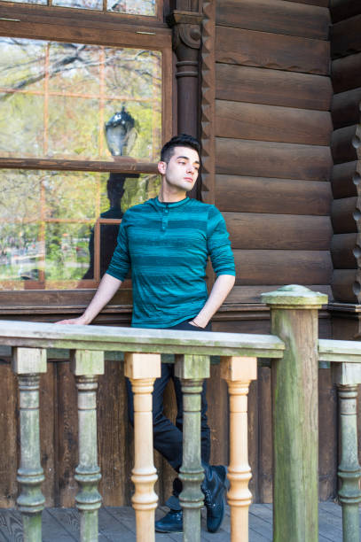 istock Young man standing outdoors in New York City, relaxing, thinking. 1333443712