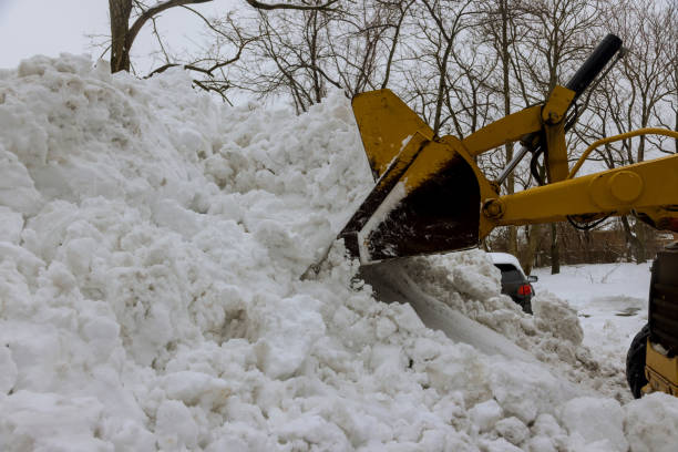 istock Clearing the road from snow tractor clears the way 1333445956