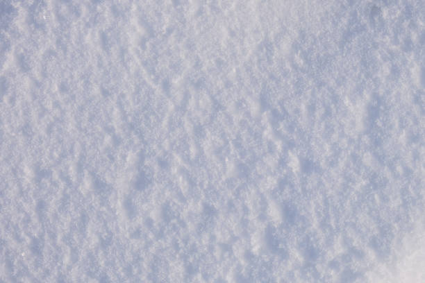 istock Texture of white snow with frozen ice, background 1333451008