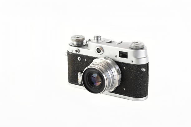 istock The old 35 mm film rangefinder camera on white background. 1333457132