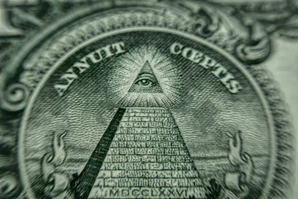 mysterious Masonic symbols on American dollar bills. His pyramid and shining eye. Back of a one dollar bill