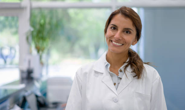 istock Female doctor looking happy at her office 1333458359