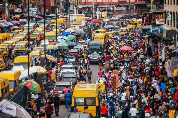 Traffic in market street.
Lagos, Nigeria, West Africa