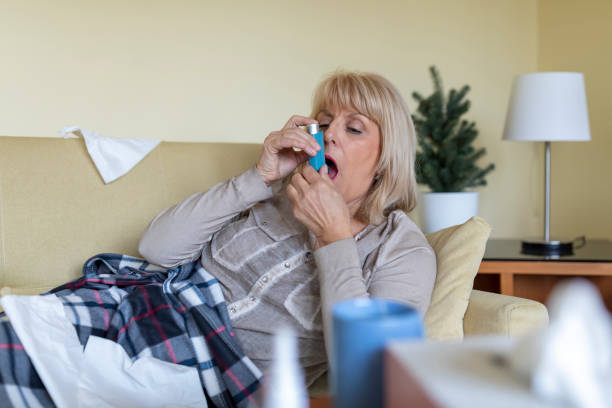 istock Asthmatic Woman With Breathing Problems is Lying in the Bed. 1333461212