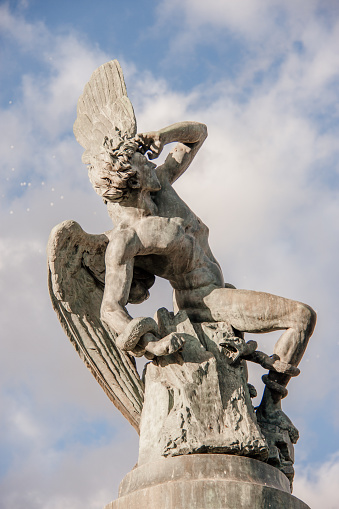 The monument of the Fallen Angel is a fountain located in the Buen Retiro Park in Madrid, Spain. Concept of travel.