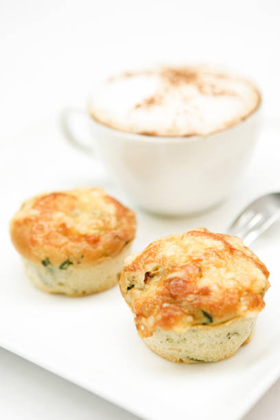 istock muffins accompanied by coffee with milk on white background 1333472383