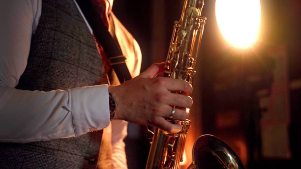 istock Hand of a man who is playing saxophone 1333472525