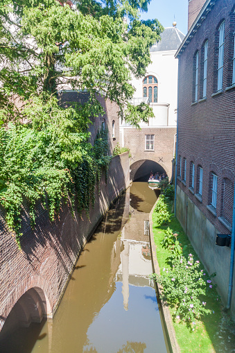DEN BOSCH, NETHERLANDS - AUGUST 30, 2016:  Tourist boat on a canal in Den Bosch, Netherlands