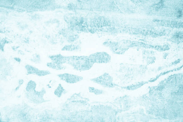 istock Pastel Blue and White concrete stone texture for background in summer wallpaper. Cement and sand wall of tone vintage. Concrete abstract wall of light cyan color, cement texture mint green for design. 1333479285