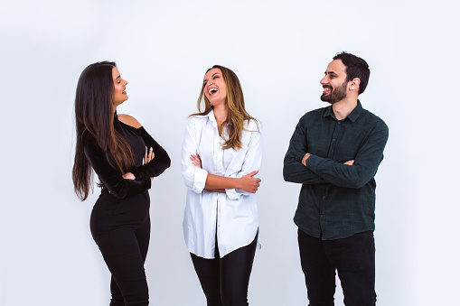 group of three people in a studio photography session