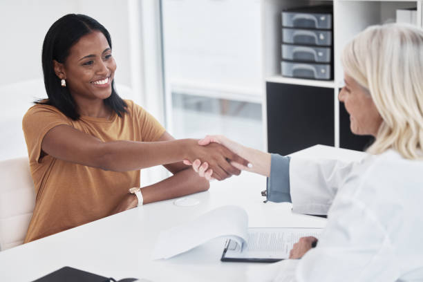 istock Shot of a doctor shaking hands with a patient 1333488055