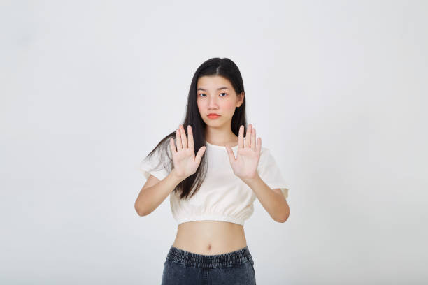 istock Asian women showing stop hand gesture 1333488869