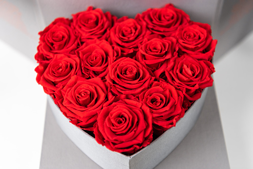 Heart shape box of red roses from above