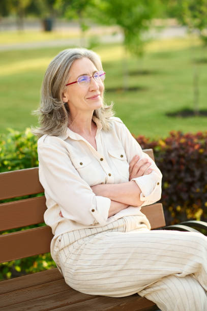 istock Smiling pretty woman with folded arms on chest 1333500892
