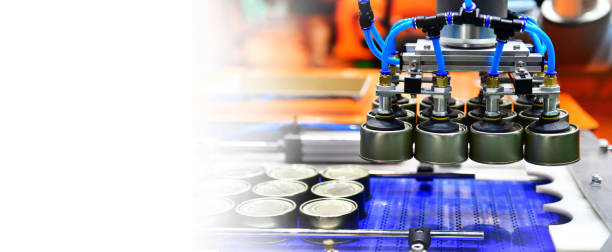 istock Canned food products on conveyor belt in distribution warehouse. 1333501801