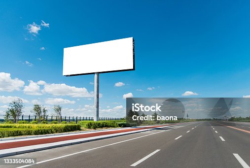 istock Blank billboard by the highway 1333504084