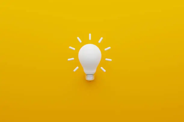 Photo of Light bulb white on yellow background. Concept of creative idea and innovation. 3d illustration