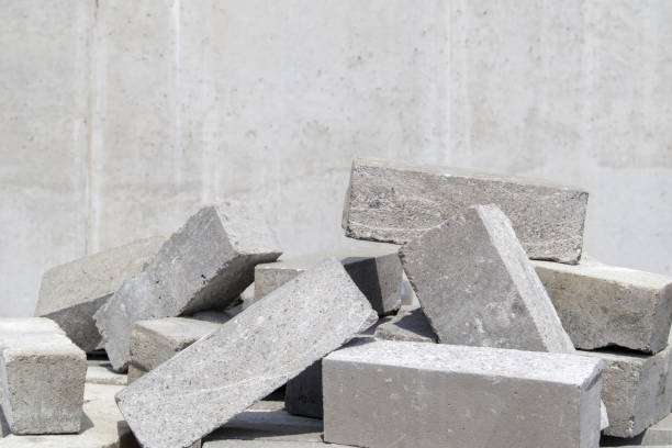 istock A pile of cement type bricks. Solid brick is used for construction. Lots of loose concrete bricks at the construction site 1333513259