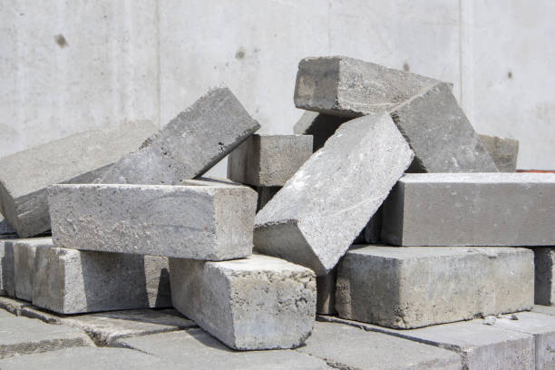 istock A pile of cement type bricks. Solid brick is used for construction. Lots of loose concrete bricks at the construction site 1333513269