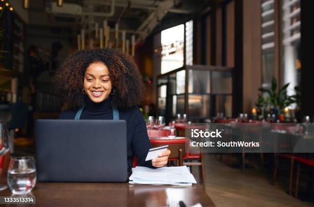 Portrait Of Restaurant Owner Using Laptop Stock Photo - Download Image Now - Business, Credit Card, Owner