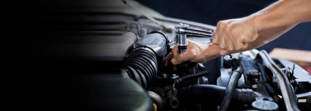 istock Car mechanic working on car engine, car maintenance concept. 1333513458