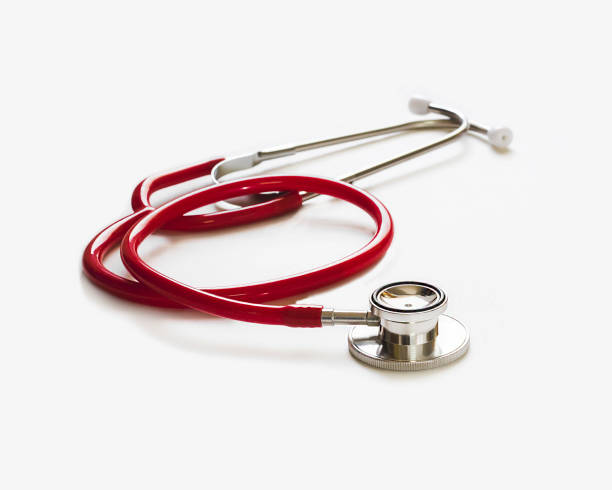 istock red stethoscope on gray background ,health care concept. 1333513481