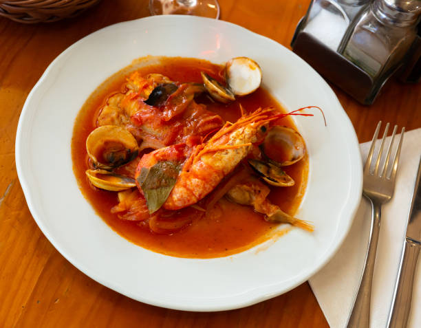 istock Tail of monkfish with shellfish, prawns 1333515681