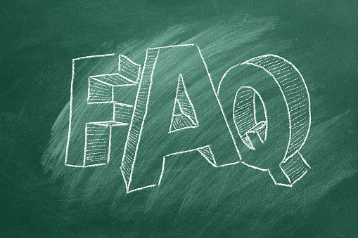 FAQ. Frequently Asked Questions. Lettering on green chalkboard.