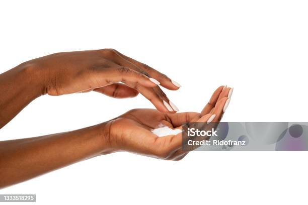 Close Up Of Black Woman Hands With Moisturizer Cream Stock Photo - Download Image Now