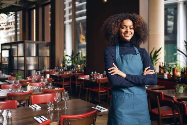 istock Cheerful small business owner in restaurant 1333520754