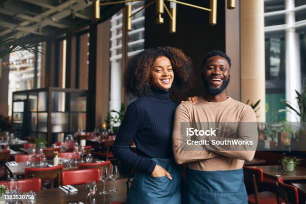 Cheerful Small Business Partners In Restaurant Stock Photo - Download Image Now - Owner, Business, Small Business