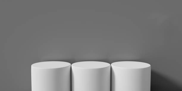 istock 3d rendering illustration of empty podium stand, blank product platform, stage show, pedestal winner in studio room. Mock up table white isolated on grey background abstract. 1333520775