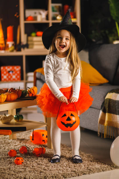 istock Little witch excited to go trick or treating for Halloween 1333521175
