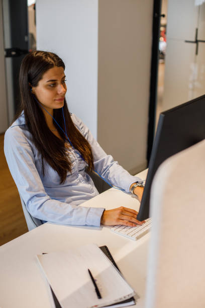 istock Female entrepreneur using computer at work and listening to music 1333523087
