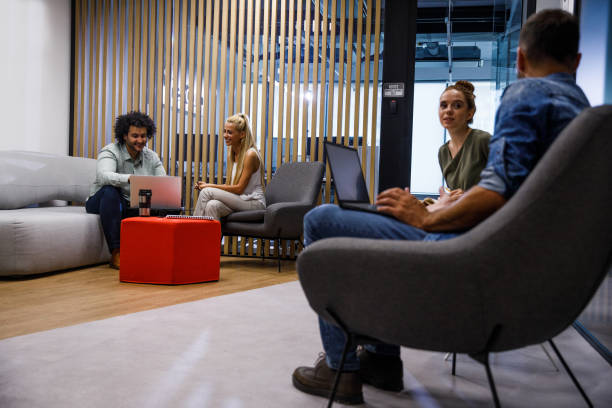 istock Group of business people casually co-working at the office hall 1333524656