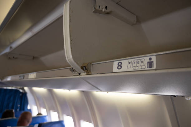 istock Luggage racks in an airplane 1333526380