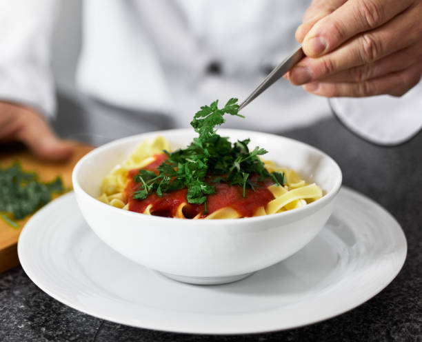istock Shot of an unrecognisable man preparing freshly made pasta 1333527074