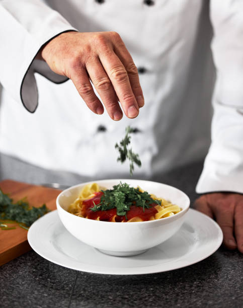 istock Shot of an unrecognisable man preparing freshly made pasta 1333527077