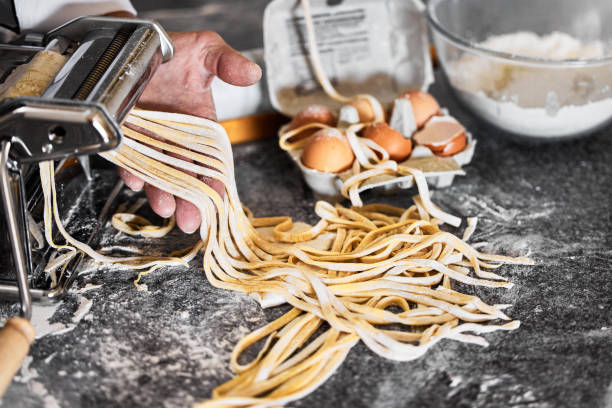 istock Shot of an unrecognisable man preparing freshly made pasta 1333527080