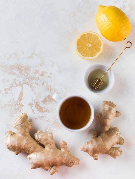 istock Flatlay tea, lemon and ginger. The concept of autumn warming tea. Copy space. 1333528705