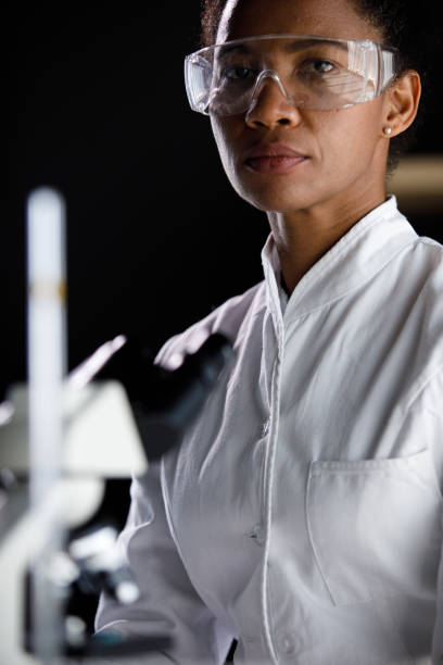 istock Serious mid adult lab tech wearing protective eyewear, looking at camera 1333528715