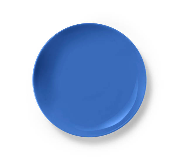 istock Top view of blue ceramic plate isolated on white background 1333532911